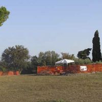 Fig. 2. View of trenches 1 and 2 on the west slope of the mound (see Fig. 1 for their locations on the east-west transect). Note the posters attached to the fences around both trenches (photo A.J. Ammerman)