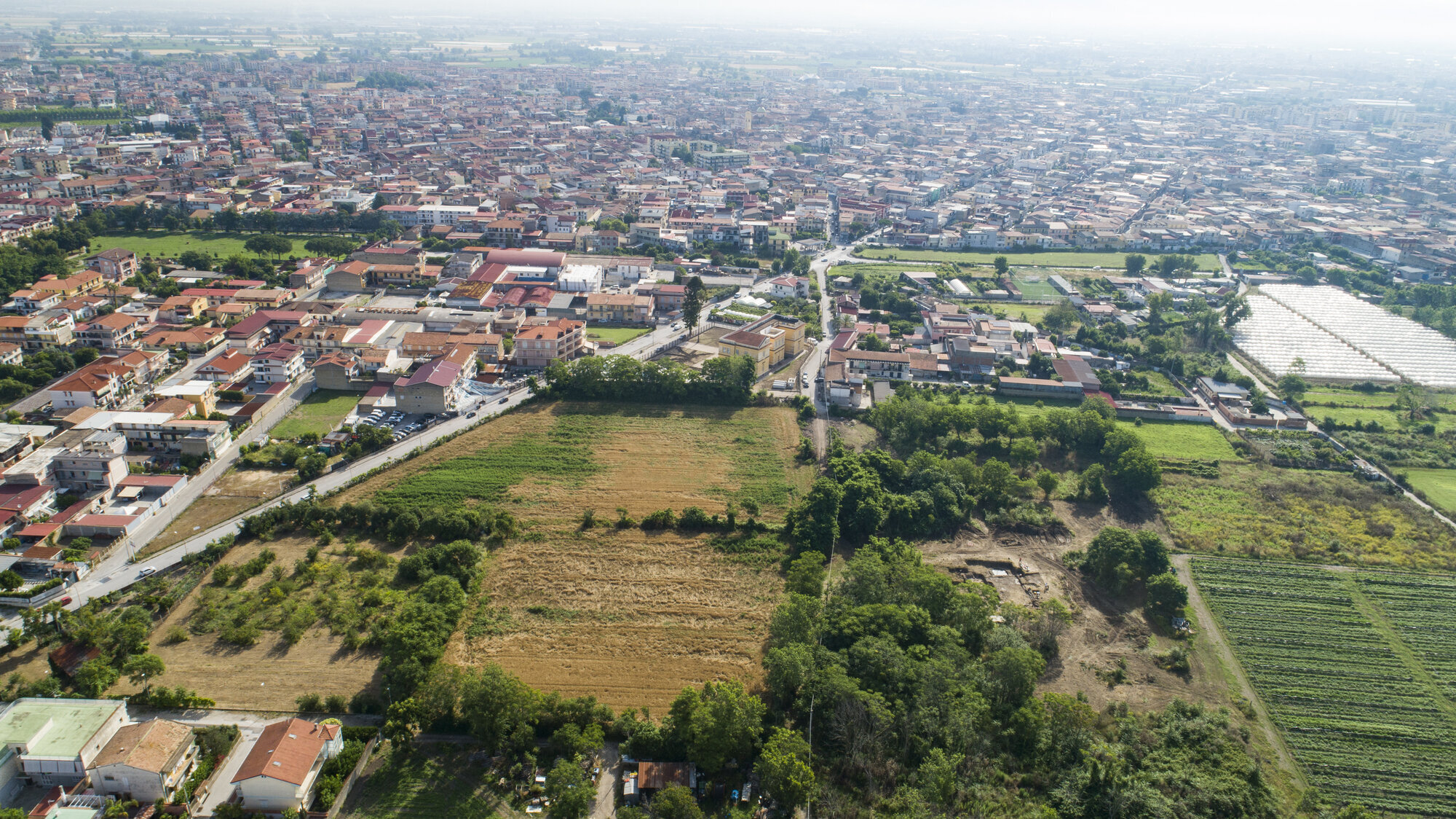 Legacy GIS data integration and non-invasive survey for the study of the archaeological landscape of Atella (Caserta, Campania, Italy)